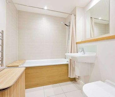 Stunning 2-bedroom apartment located on the upper floor of this dev... - Photo 2