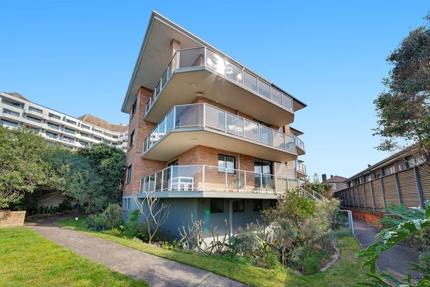 Renovated Beachside Elegance with Ocean Views - Photo 1