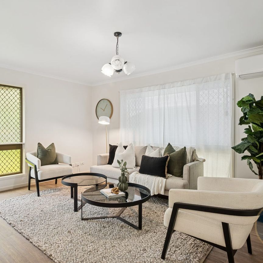 Comfortable Family Home with Modern Touches & Spacious Yard - Photo 1