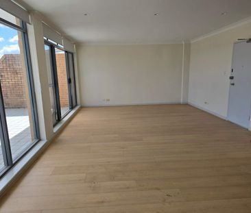 Partially furnished-Newly Renovated 3-Bedroom Apartment in the Hear... - Photo 1