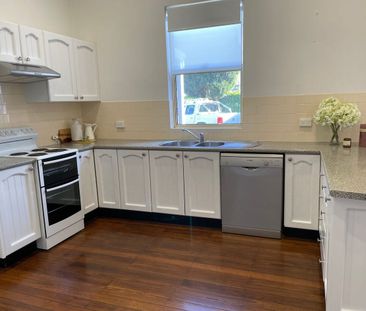 2 bed 1 bath 1 car garage High Ceilings New Tranquil deck surrounde... - Photo 2