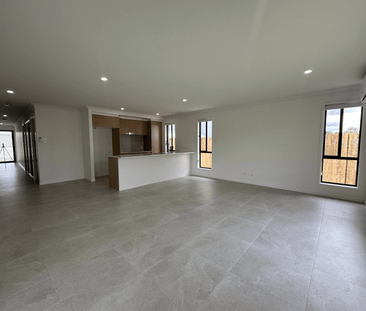 Spacious 4-Bedroom, 2-Bathroom House - Photo 1