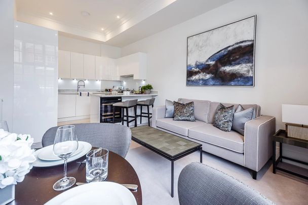 An exclusive loft apartment located in a converted warehouse development overlooking the River Thames. - Photo 1