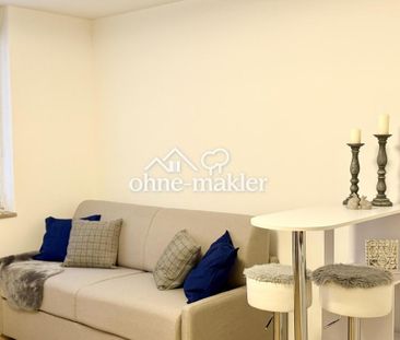 Erstbezug nach Sanierung – hochwertig möbliertes Apartment mit Tief... - Foto 4