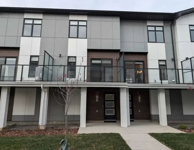 Cozy 2 bedrooms townhouse | 307 - 8235 8 Avenue Southwest, Calgary - Photo 1