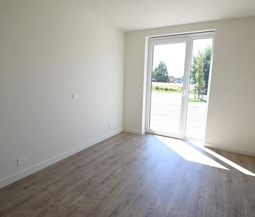 NIEUWBOUW 1-slaapkamerapp met ZONNIG terras & autostaanplaats! - Photo 1