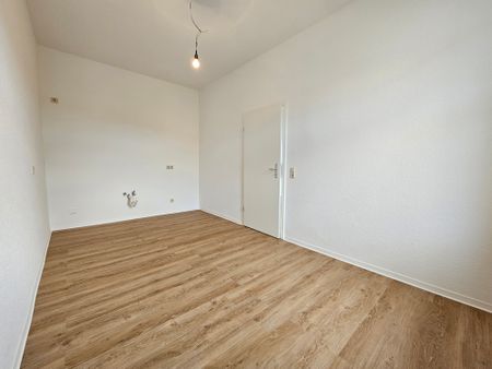 Diese schöne renovierte Wohnung wartet auf Sie mit Einbauküche - Foto 4