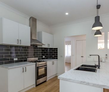 Freshly Updated 3-Bedroom Home with Spacious Backyard - Photo 4