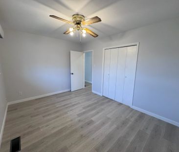 Central – 2 bed, 1 bath main floor suite - Photo 1