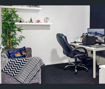 Modern 4-Bedroom Home with Multiple Living Spaces - in Prime Location - Photo 6