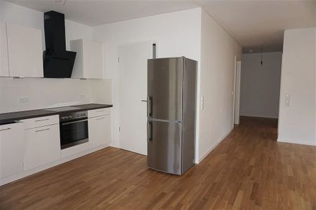 Moderne Erdgeschosswohnung mit Einbauküche und Terrasse! Mit direktem Blick auf die Mosel - Photo 5