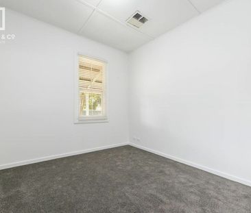 CENTRAL AND CHARMING - Photo 1