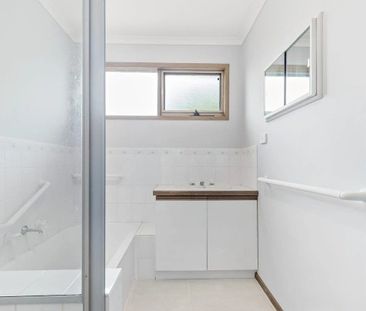 Charming Three-Bedroom House with a Huge Shed! - Photo 4