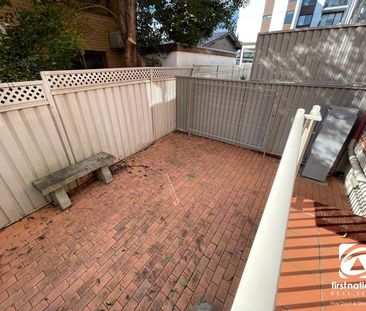 Spacious Two Bedroom Townhouse with Lock-Up Garage - Photo 4