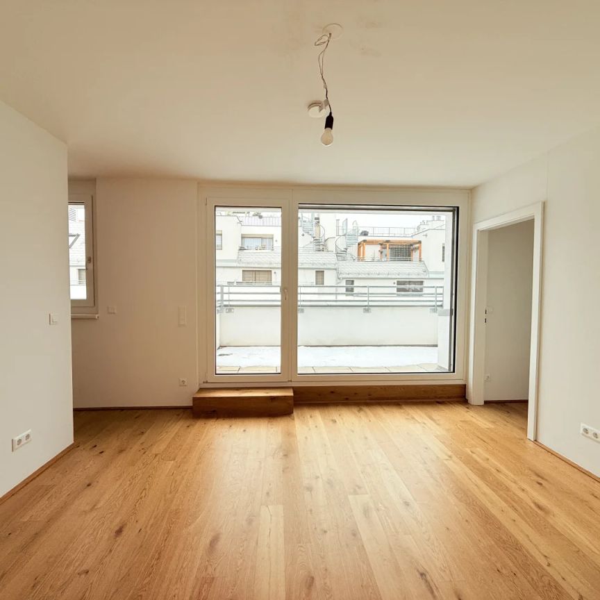 Kompakte 2-Zimmer Wohnung in schönem Neubau wartet auf einen neuen Mieter - Foto 1