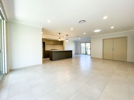 CORNER HOUSE: 4 BEDROOM, 2.5 BATHROOM, 2 CAR GARAGE, PLUS BONUS THEATRE/HOME OFFICE - Photo 1