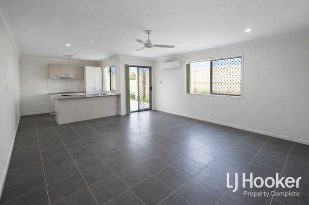Affordable Comfort in Prime Loganlea Location! - Photo 1