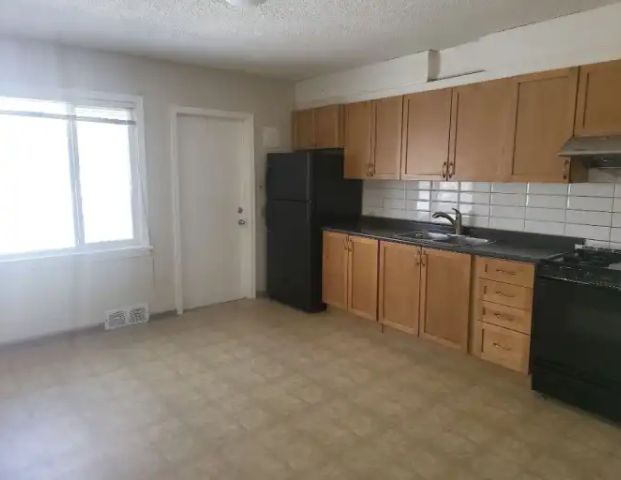 Bright 2-Bedroom Main Floor - Bankview | 1902 26 Avenue Southwest, Calgary - Photo 1