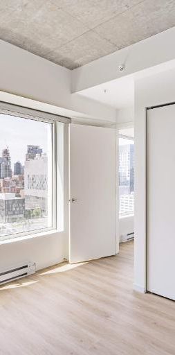 3 1/2 dans un projet locatif moderne à Place Gare Viger - Photo 1