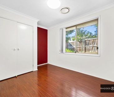 Modern and light filled haven in family friendly locale - Photo 3