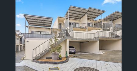 Suave Villa-Style Townhouse - Photo 5