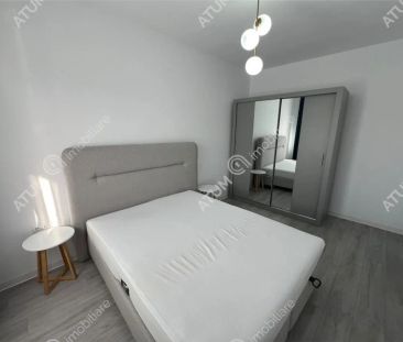 De inchiriat apartament 2 camere decomandate balcon loc propriu de parcare situat in Selimbar Sibiu - Photo 3