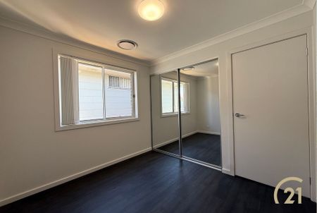 Brand New 4 Bedroom Home, Located in Austral! - Photo 3