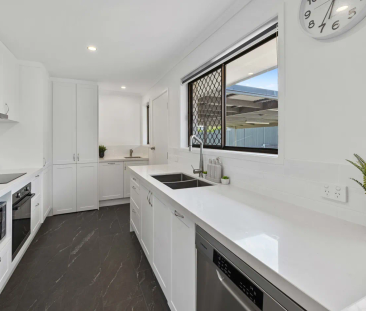 Charming Family Home with Shed & Outdoor Entertaining - Photo 6