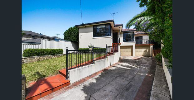 Modern and Private Family Home is Highly Sought Locale - Photo 1