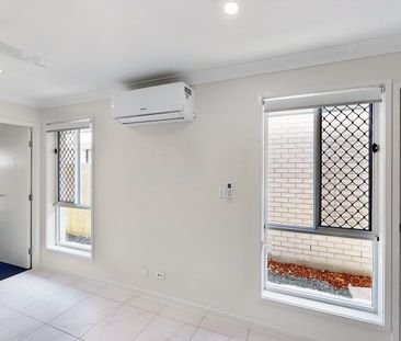 Discover Your Ideal Home in Logan Reserve! - Photo 1