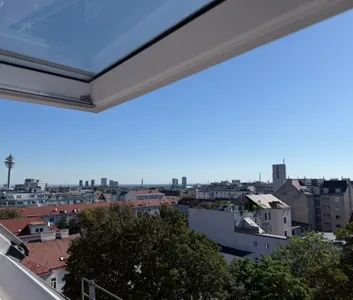 Helle DG-Wohnung mit Fernblick - 2(-3) Zimmer nahe U1, Tram & CEU | teilmöbliert - Foto 3