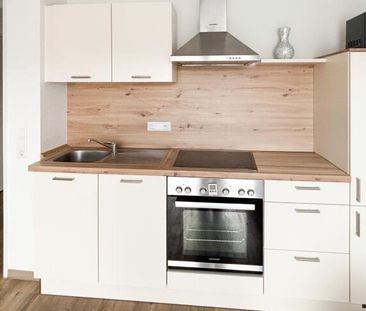 Lichtdurchflutete 2-Zimmer-Wohnung mit Balkon in ruhiger Lage in We... - Photo 3