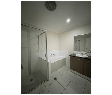 Modern 3-Bedroom Home with Fully Fenced Yard - Photo 6