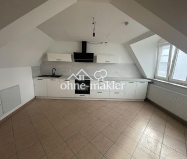 Renovierte 3-Zimmer Dachgeschosswohnung mit toller Anbindung - Photo 1