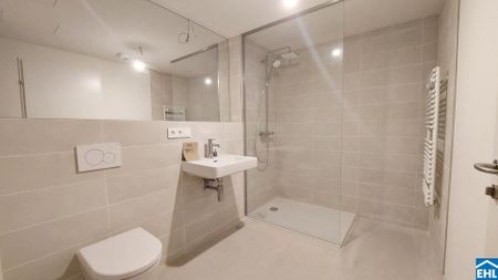 Moderne 1,5-Zi.-Wohnung mit Loggia & Rooftop Wellness - Photo 2