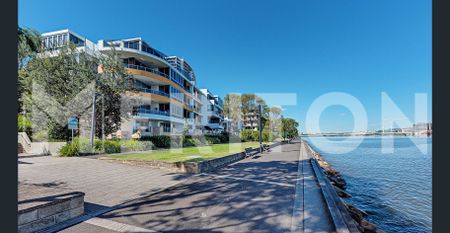 Absolute Waterfront Luxurious Two Bedroom Apartment - Photo 2