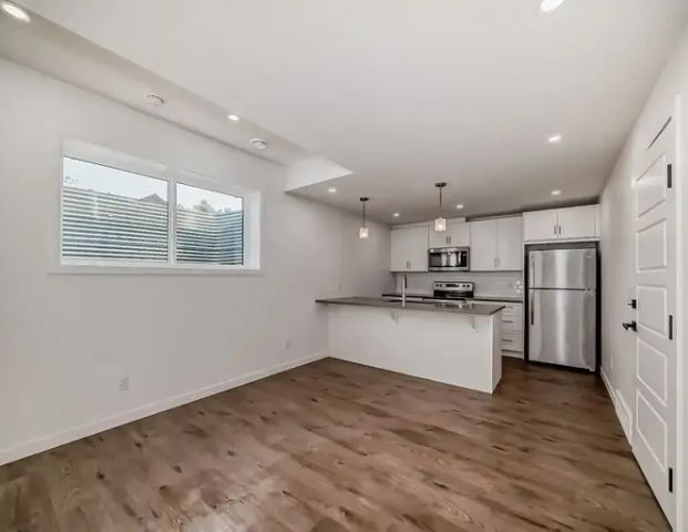 BRAND NEW UNIT IN CAPITOL HILL | 1502 22 Avenue Northwest, Calgary - Photo 1