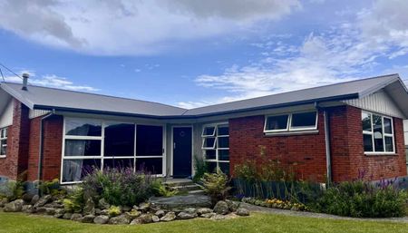 A Standout Queenwood Home You Won’t Want to Miss - Photo 2