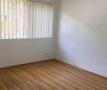 CONVENIENTLY LOCATED 2 BEDROOM UNIT - Photo 2