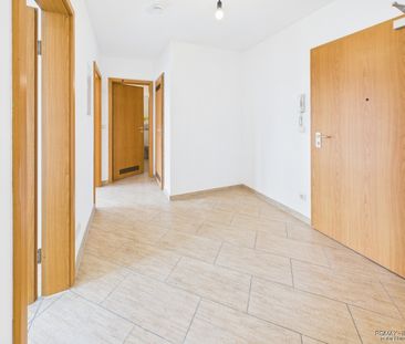 Moderne Wohnung mit neuer EBK und schönem Balkonblick - Foto 1