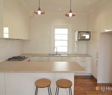 TASTEFULLY RESTORED & CLOSE TO TOWN - Photo 6