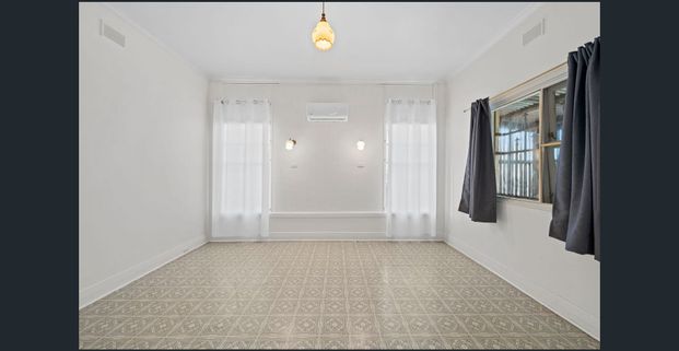 Retro Home with a 15 minute walk to the Beach! - Photo 1