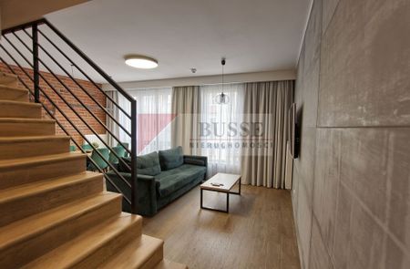 Mieszkanie 2-poziomowe na Starym Mieście - Photo 4