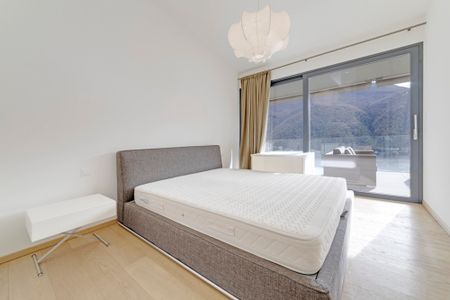 ELEGANTE APPARTAMENTO DI 4.5 LOCALI CON GIARDINO E VISTA LAGO - Photo 4