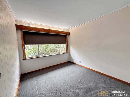 Modern 4-Bedroom Home Near the River - Photo 3