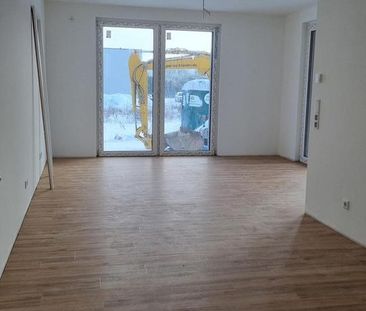 Erstbezug in Voxtrup: Exklusive 2ZKB EG-Wohnung mit Terrasse + Stel... - Photo 1