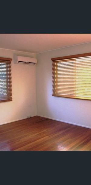 Charming Home with Timber Floors - Photo 1