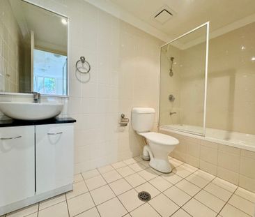 ULTRA CONVENIENT 1 BEDROOM WITH STUDY AND 2 BATHROOMS APARTMENT - Photo 6