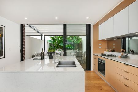 Three Bedroom Terrace with Garage Parking - Offered Unfurnished - Photo 4