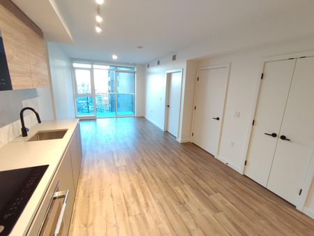 University District One Bedroom Condo with Storage and Parking - Photo 3